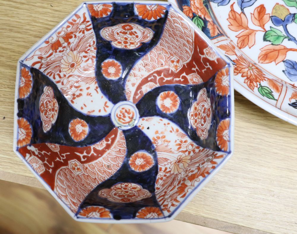 A Japanese Imari oval dish with six-character mark to base and six other items of Japanese Imari